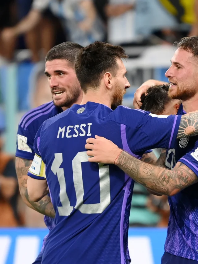 messi and team argentina celebrating on the field